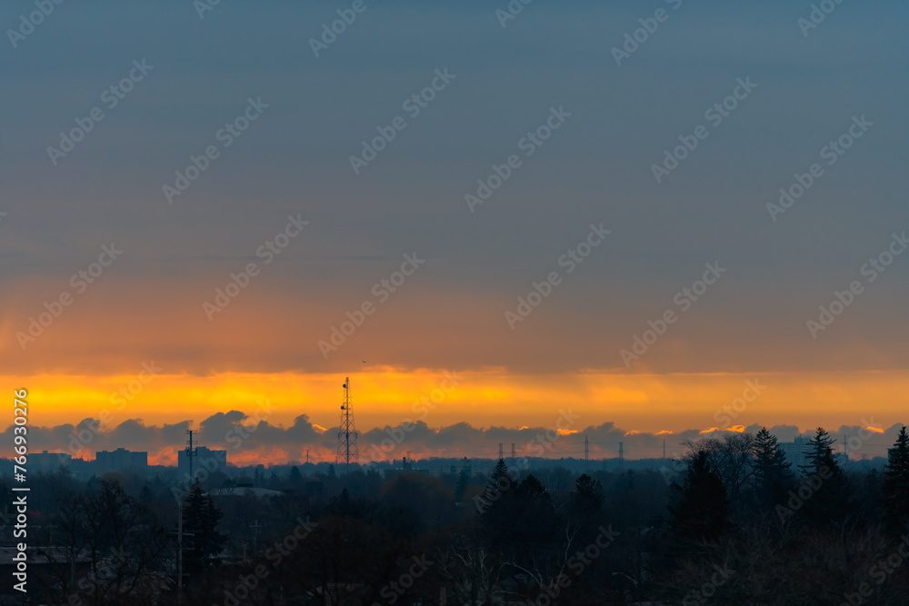 Dawn sky over the silhouette of Scarborough, Ontario, Canada Dawn sky over the silhouette of Scarborough, Ontario, Canada