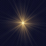 Glowing light explodes, light flash golden color. Beam of the shining sun. Special glare light effect. Bright flash.