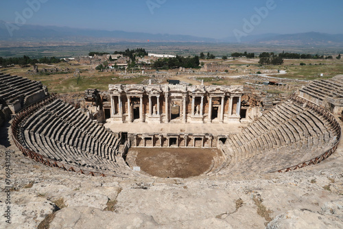 The Amphitheater Theater at the archaeological site of Hierapolis with the surrounding landscape in the background, Pamukkale, Denizli, Turkey