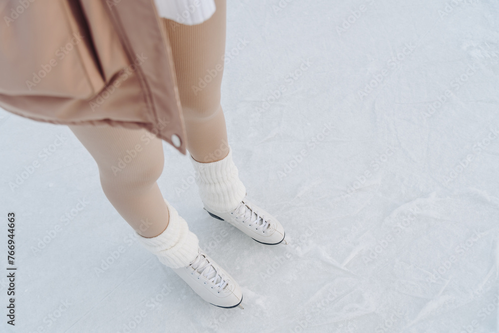 young redhead girl in ice rink young redhead girl in ice rink