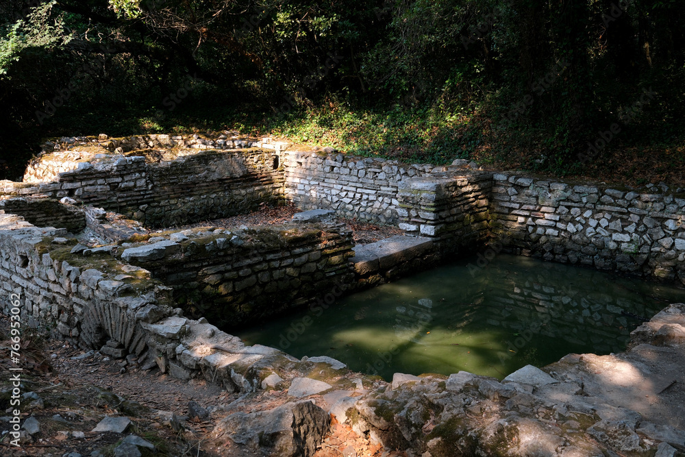 Ruins of the Great Basilica in Butrint National Park, Buthrotum, Albania. Triconch Palace at Butrint Life and death of an ancient Roman house Historical medieval Venetian Tower surrounded Ruins of the Great Basilica in Butrint National Park, Buthrotum, Albania. Triconch Palace at Butrint Life and death of an ancient Roman house Historical medieval Venetian Tower surrounded