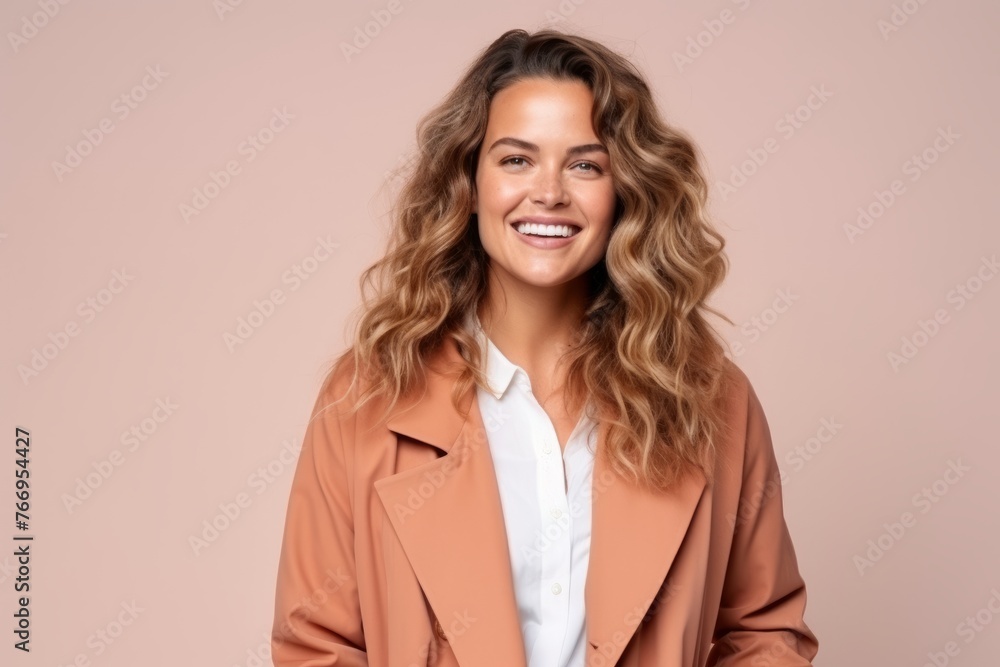 Portrait of a beautiful young business woman smiling at the camera over pink background Portrait of a beautiful young business woman smiling at the camera over pink background