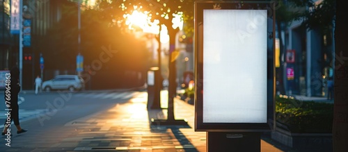 Advertisement poster displayed on an outdoor kiosk.