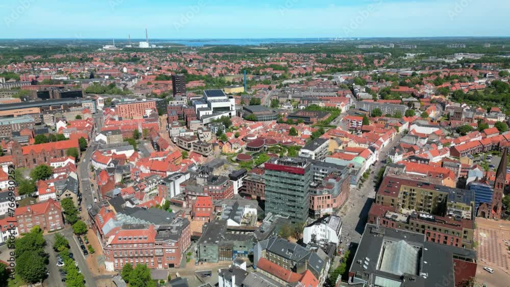 Odense, Denmark: Aerial view of city on island of Funen, summer sunny day with clear blue sky - landscape panorama of Europe from above
Odense, Denmark: Aerial view of city on island of Funen, summer sunny day with clear blue sky - landscape panorama of Europe from above