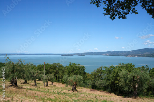 The Trasimeno lake at summer near Torricella and Monte del Lago photo