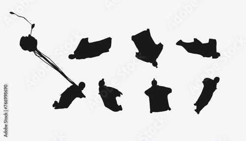 silhouette set of wingsuit flying, sky dive, extreme sport. vector illustration. photo