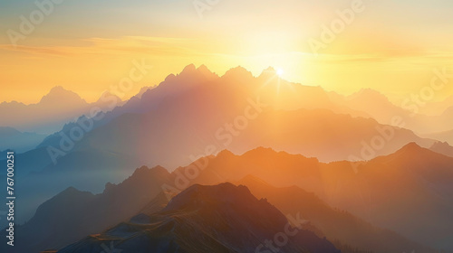 Majestic Sunrise Over Misty Mountain Peaks