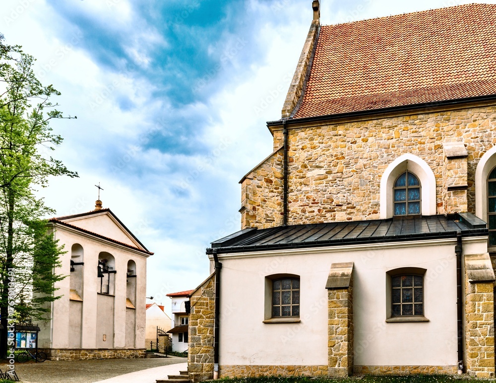 Catholic Cathedral in Jaslo, Poland. A Catholic church is a religious building that serves as a gathering place for believers to read prayers.