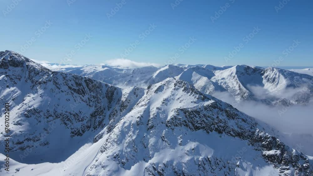 Amazing Aerial Winter view of Rila mountain near Musala peak, Bulgaria Amazing Aerial Winter view of Rila mountain near Musala peak, Bulgaria