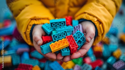 Child Playing With Stack of