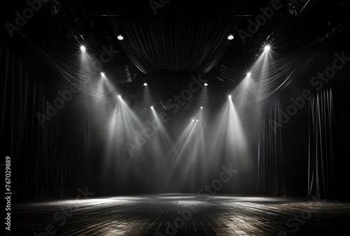 a stage with lights and a black curtain