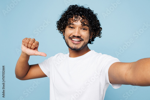 Εκτύπωση καμβά Close up young Indian man he wear white t-shirt casual clothes doing selfie shot