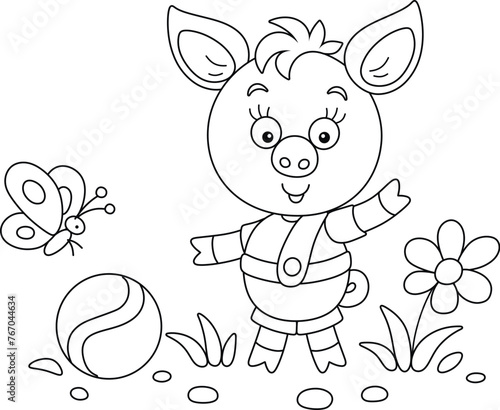 Funny cartoony little piglet playing with its ball and merry butterfly on a summer lawn, black and white outline vector cartoon illustration for a coloring book