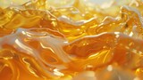 Abstract Close-Up of Glistening Golden Honey Flowing at Daytime