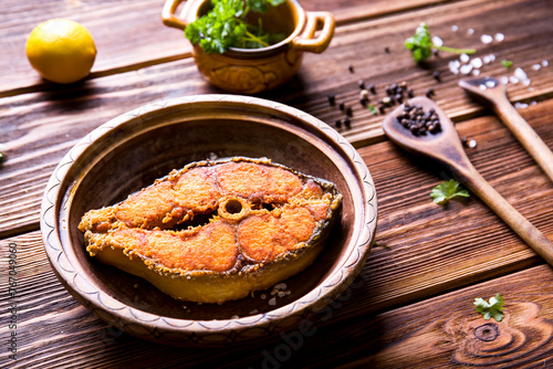 Fried fish on wood