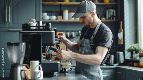 Professional young repairman repairs a coffee maker