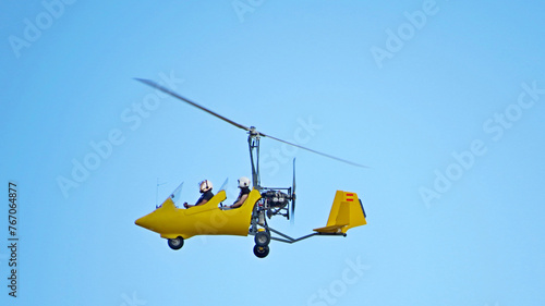 autogyro yellow blades propellers sports flying casarrubios airport monte background blue sky photo