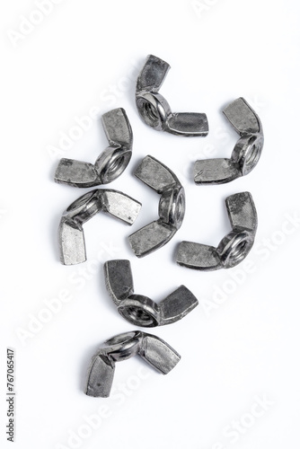 Eight iron wingnuts isolated on white background