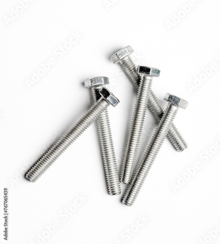 Five stainless steel bolts isalated on white background
