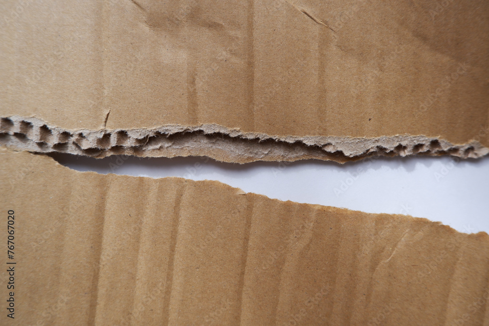 ripped cardboard piece paper note. damage cardboard for background ...
