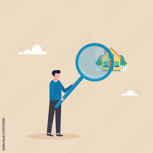 Rent and mortgage concept, smart businessman using magnifying glass zoom to see details of house or living space. Looking for a new home, real estate or housing. 