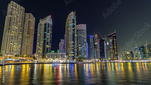 Dubai Marina towers and canal in Dubai night timelapse hyperlapse © neiezhmakov