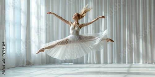 A young Caucasian ballerina displays elegance and grace in studio, jumping with poise.