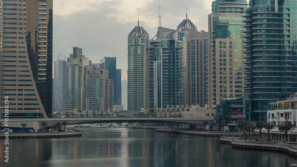 View of Dubai Marina towers and canal in Dubai morning timelapse