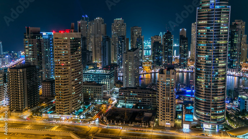 Aerial top view at night timelapse of Dubai Marina in Dubai, UAE