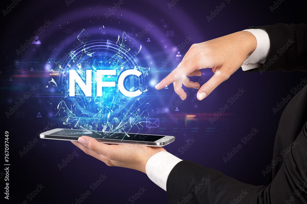 Close-up of a touchscreen with abbreviation. Close-up of a touchscreen with abbreviation.