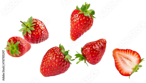 Falling strawberries isolated on white background 