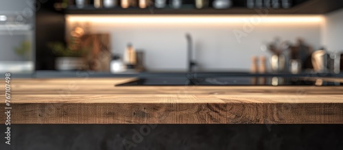 Kitchen counter with a blurred background featuring a wooden table top.