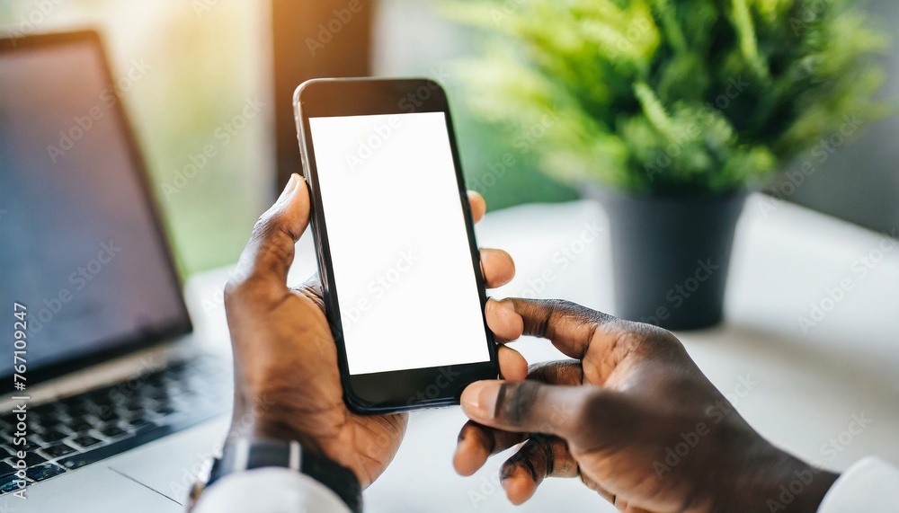 Mobile Phone for Mockup - Mobile Phone held by Hand in an Office or Cafe Environment - Template for Application Presentation Mobile Phone for Mockup - Mobile Phone held by Hand in an Office or Cafe Environment - Template for Application Presentation