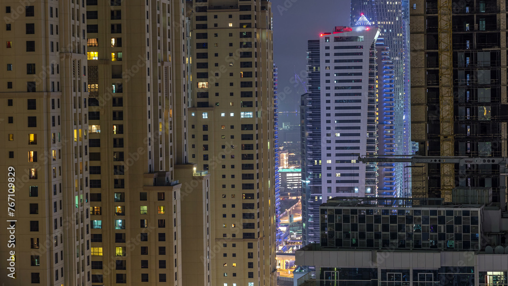 Night illumination of Dubai Marina aerial timelapse, UAE.