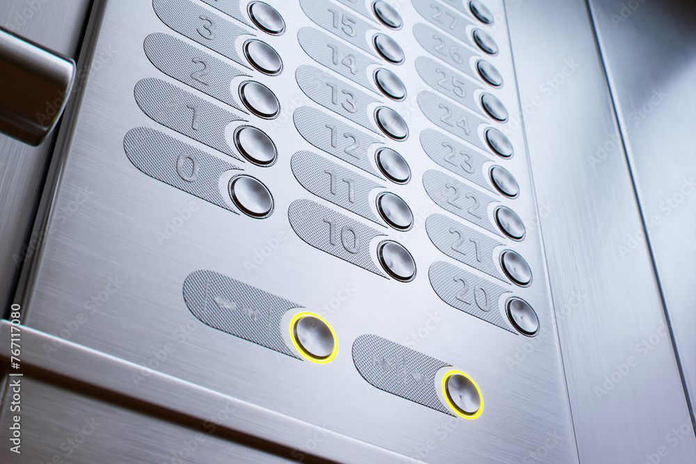 Sleek Elevator Control Panel with Illuminated Floor Selection Buttons
