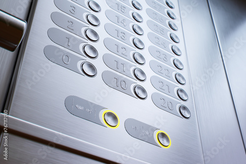 Obraz na płótnie Sleek Elevator Control Panel with Illuminated Floor Selection Buttons w salonie