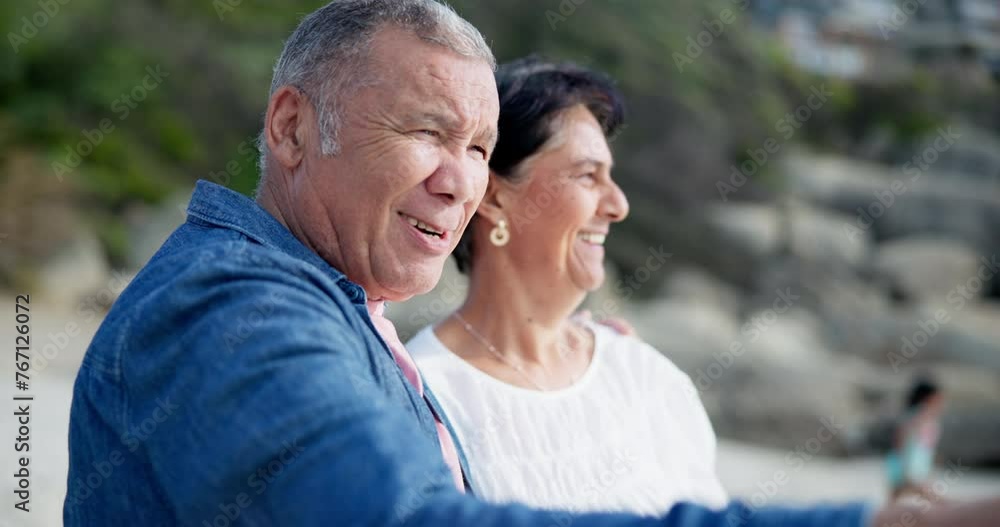 Nature, beach and elderly couple with point for holiday, travel and sightseeing on vacation in California. Happy, people and adventure by ocean with gesture for view, direction and retirement getaway Nature, beach and elderly couple with point for holiday, travel and sightseeing on vacation in California. Happy, people and adventure by ocean with gesture for view, direction and retirement getaway