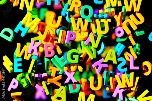 Colorful 3D Alphabet Letters Scattered Playfully on a Dark Background