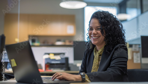 Cheerful Businesswoman Being Productive on Laptop