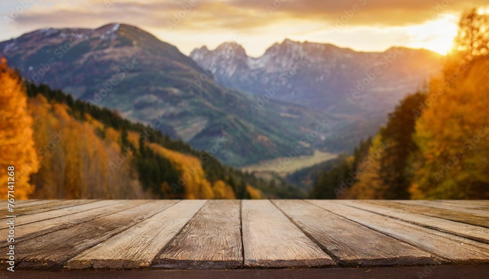 empty wooden desk with autumn mountains background