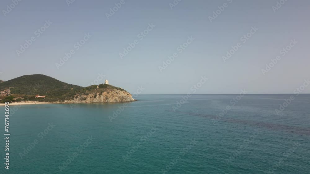 Aerial view of the Sardinian coast. Crystal clear sea of Chia beach. Calm and sunny sea Aerial view of the Sardinian coast. Crystal clear sea of Chia beach. Calm and sunny sea
