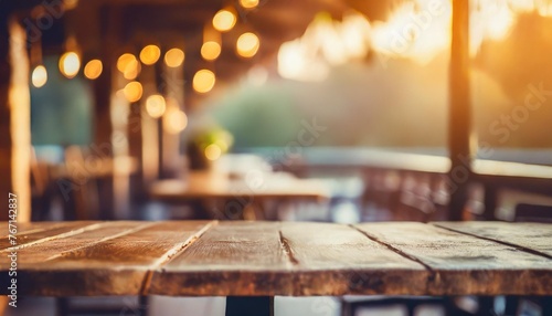 empty rustic bar restaurant cafe wooden table space platform with defocused blurry pub interior sunny weather autumn summer spring warm cozy house cottage core mockup product display background photo