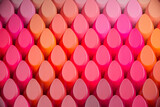 Vibrant Collection of Assorted Lipsticks in Close-Up View, Emphasizing Texture
