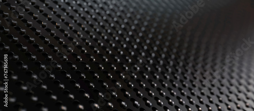 Close-up of a black hexagonal pattern texture
