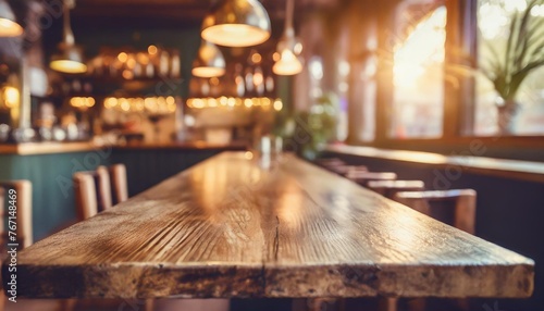 bar table interior in pub with wooden counter background desk space blurred light for drink design cafe top in coffee restaurant vintage retro style wine shop brown alcohol abstract blurry kitchen © Aedan