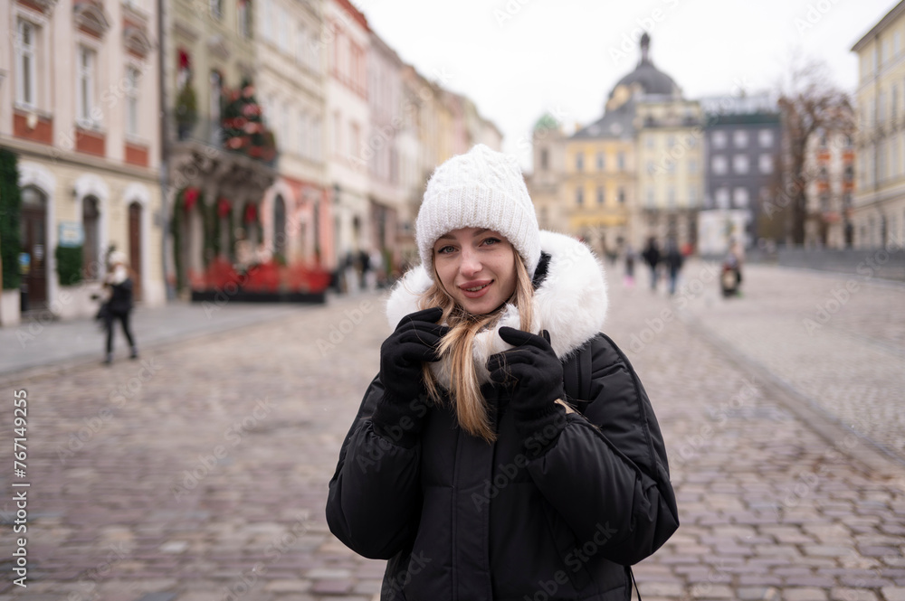 Young attractive woman standing on the street Young attractive woman standing on the street