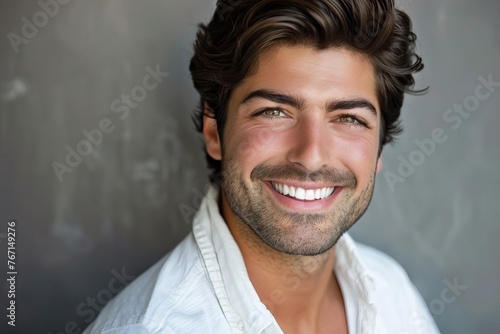 Closeup Portrait of Smiling Handsome Man with Clean Teeth and Fresh Stylish Hair - Dental Ad Photography