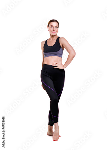 Gym Fitness. Smiling adult woman. Isolated over white background