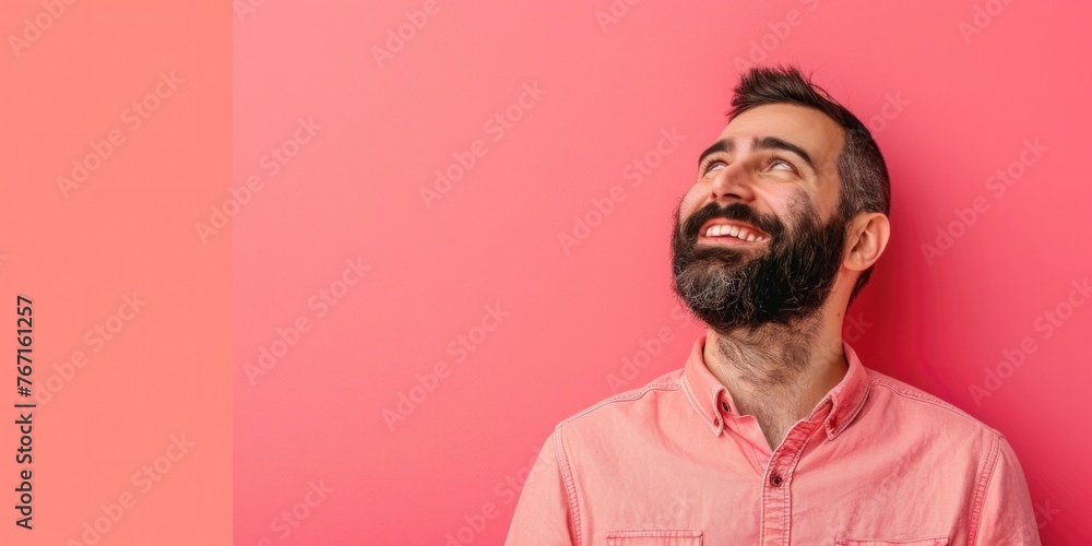 Obraz premium Middle Eastern Man Smiling Against Pink