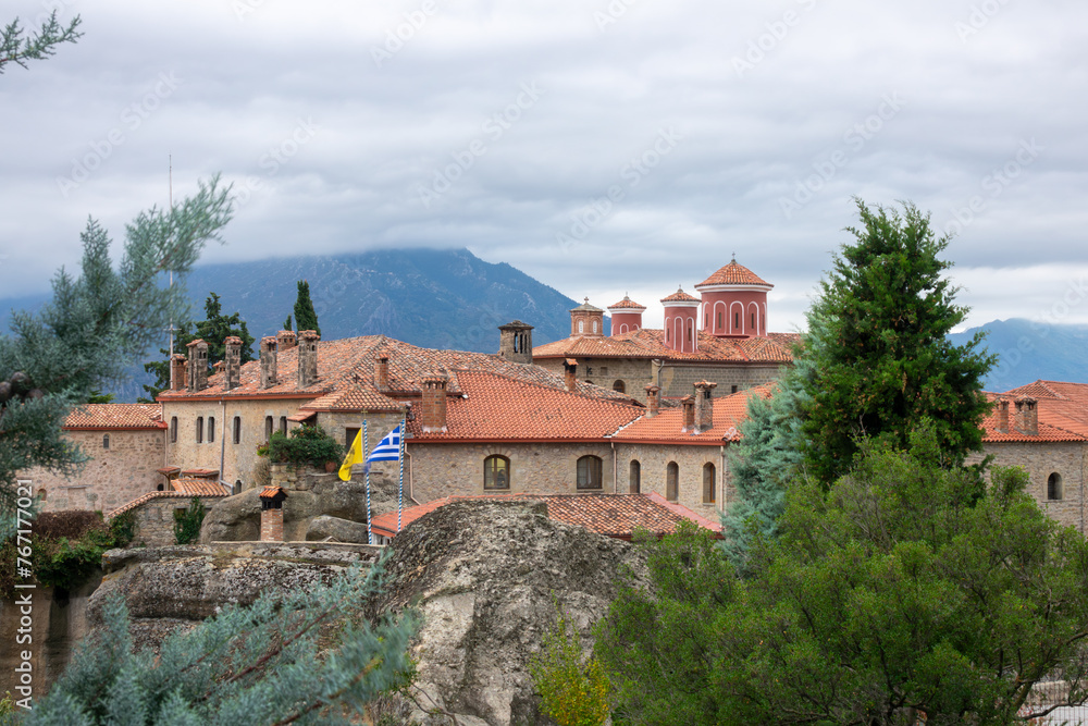 Greek Monastery with Red Roofs In Cloudy Weather